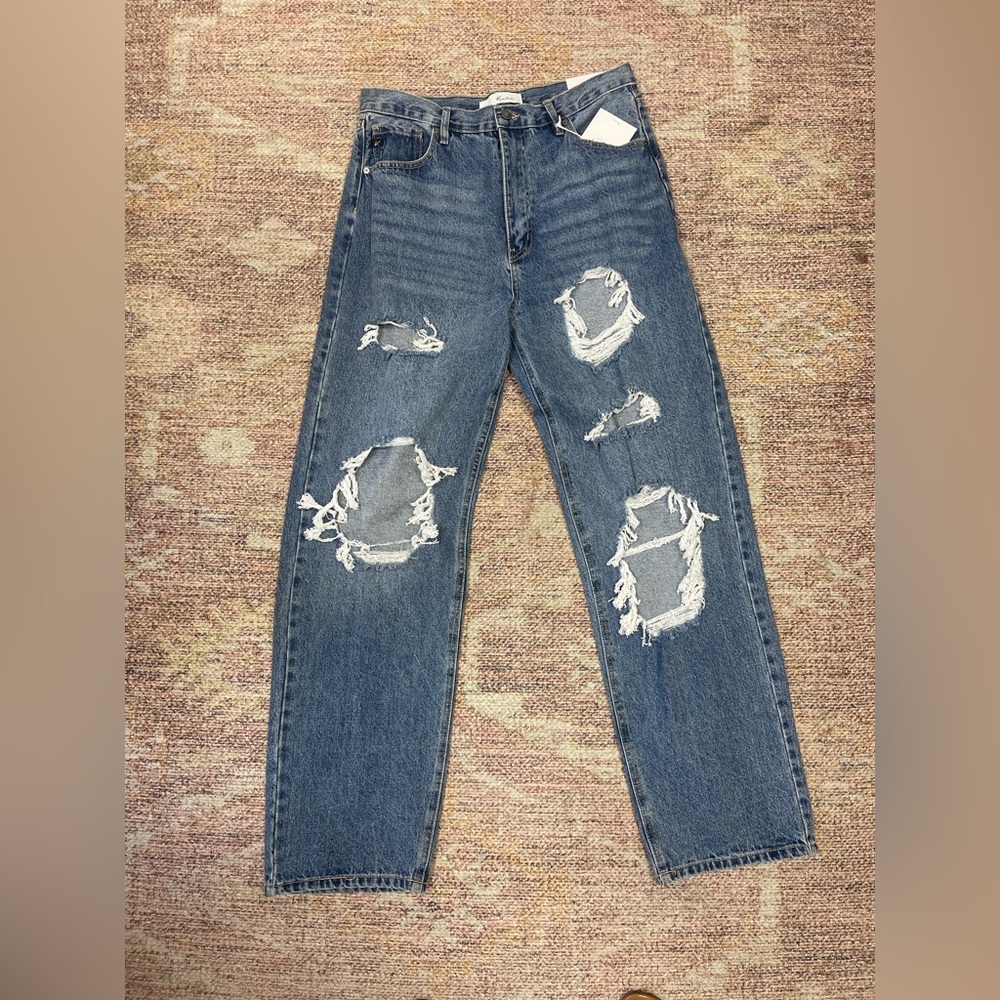Distressed Blue Jeans